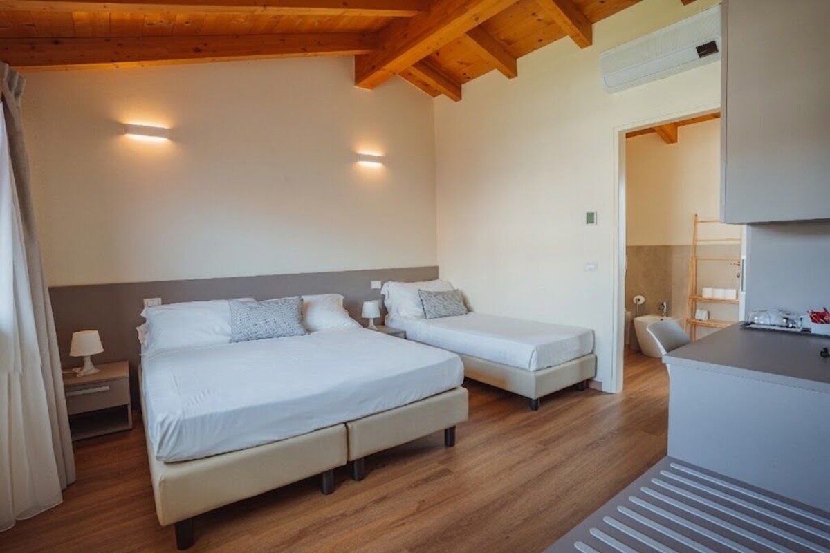 Triple Room, Garden View | Premium bedding, minibar, desk, soundproofing