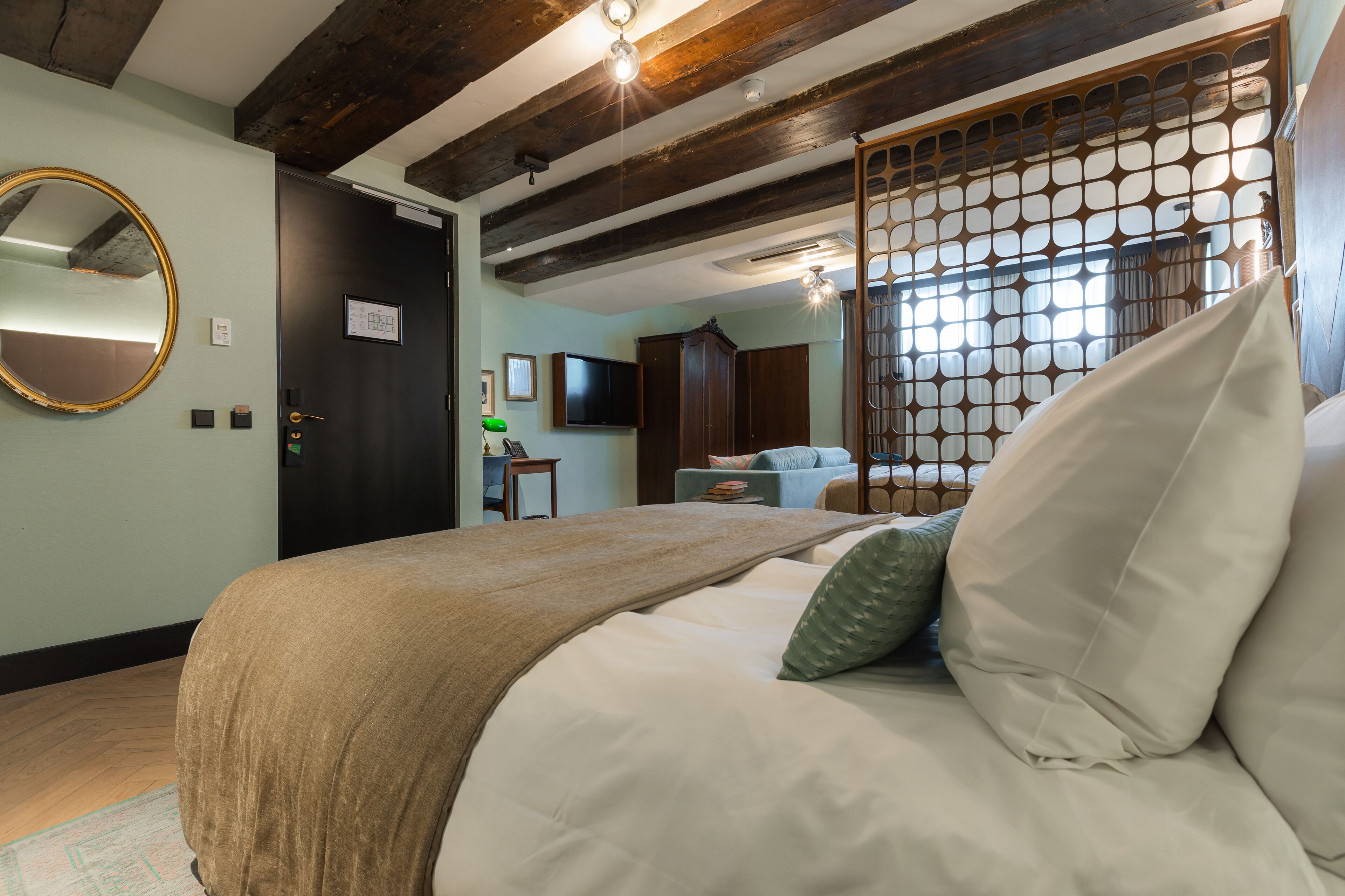 quadruple room (semi-basement) | 1 bedroom, hypo-allergenic bedding, minibar, in-room safe