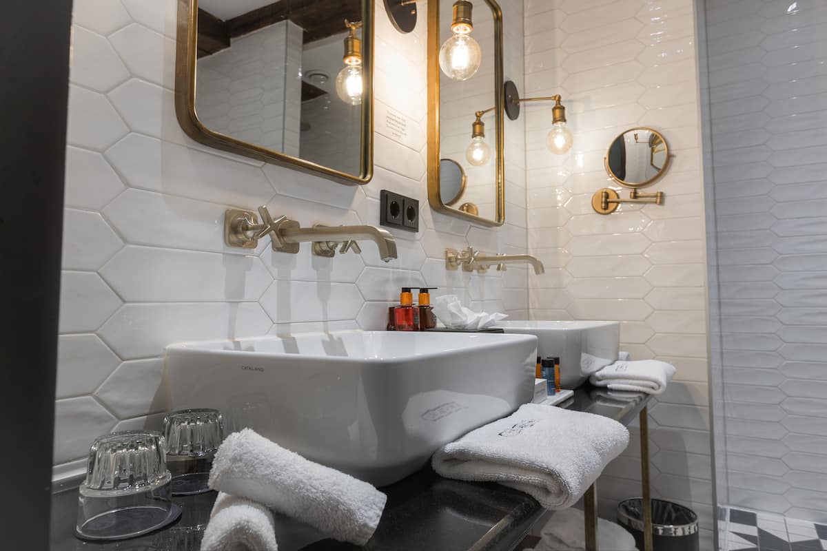 quadruple room (semi-basement) | bathroom | shower, rainfall showerhead, free toiletries, hair dryer