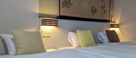 Bộ đồ giường cao cấp, chăn bông, két bảo mật tại phòng