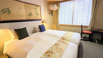 Premium bedding, down comforters, in-room safe, blackout drapes