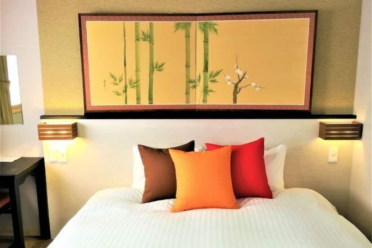 Premium-sengetøj, dundyner, pengeskab på værelset, mørklægningsgardiner