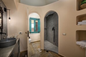 Shower, designer toiletries, hair dryer, bathrobes