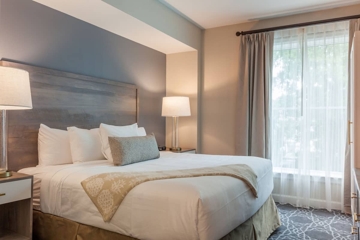 1 bedroom, premium bedding, laptop workspace, iron/ironing board