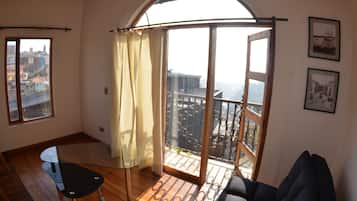 Standard Apartment, Ocean View, Tower | Living area | Flat-screen TV