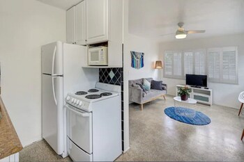 One King Bed Cottage | Private kitchen | Microwave, coffee/tea maker, toaster at Sea Garden by the Sea