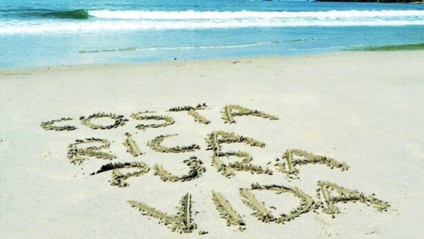 A beach with the words "SANTA ROSA VIDA" written in the sand. - Manuel Antonio Hostel Resort (Quepos)