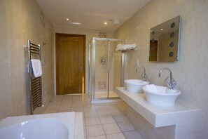 Bathtub, hair dryer, towels, soap