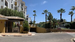 A gated entrance to a hotel with a sign reading "MARINA DE LA DUQUESA". - La Duquesa Port, South facing ground floor apartment, with large terrace (Puerto Duquesa)