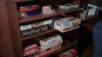 Games and reading materials are available for guests to enjoy.