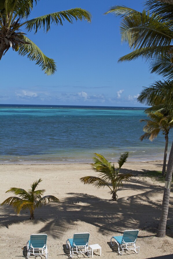 On the beach, sun-loungers, beach towels