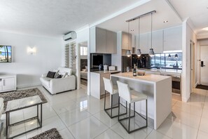 Apartment, 1 Bedroom, Ocean View (1306) | Living area | TV, DVD player - Whitsunday West 605 or 1306 (Whitsundays)