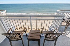A balcony with a view of the beach and ocean. - 4BR/3BA, Sleeps 16, Large Oceanfront, Balcony (Myrtle Beach)
