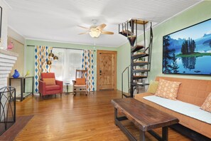 Smart TV, fireplace, books