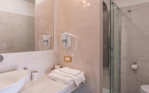 Shower, free toiletries, hair dryer, bidet