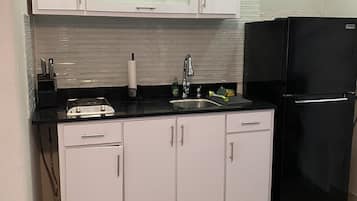 Fridge, microwave, stovetop, coffee/tea maker
