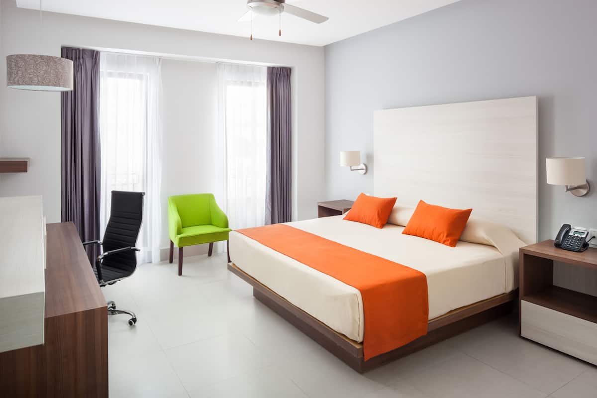 premier room, 1 king bed | in-room safe, desk, iron/ironing board, free wifi