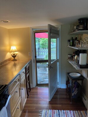 Fridge, microwave, stovetop, coffee/tea maker