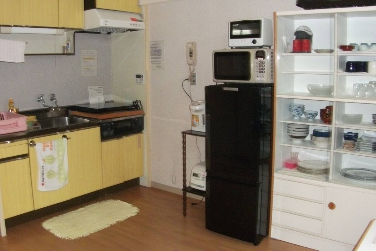 Japanese Western Style Family Room | Private kitchen | Full-size fridge, microwave, oven, stovetop