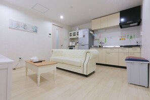 Luxury Apartment, 5 Bedrooms | Living area | Flat-screen TV