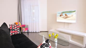 Premium Suite, 1 Bedroom, Balcony, Lake View | Living room | Flat-screen TV