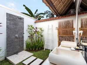 Family Villa, 4 Bedrooms, Pool View | Bathroom | Shower, rainfall showerhead, free toiletries, towels