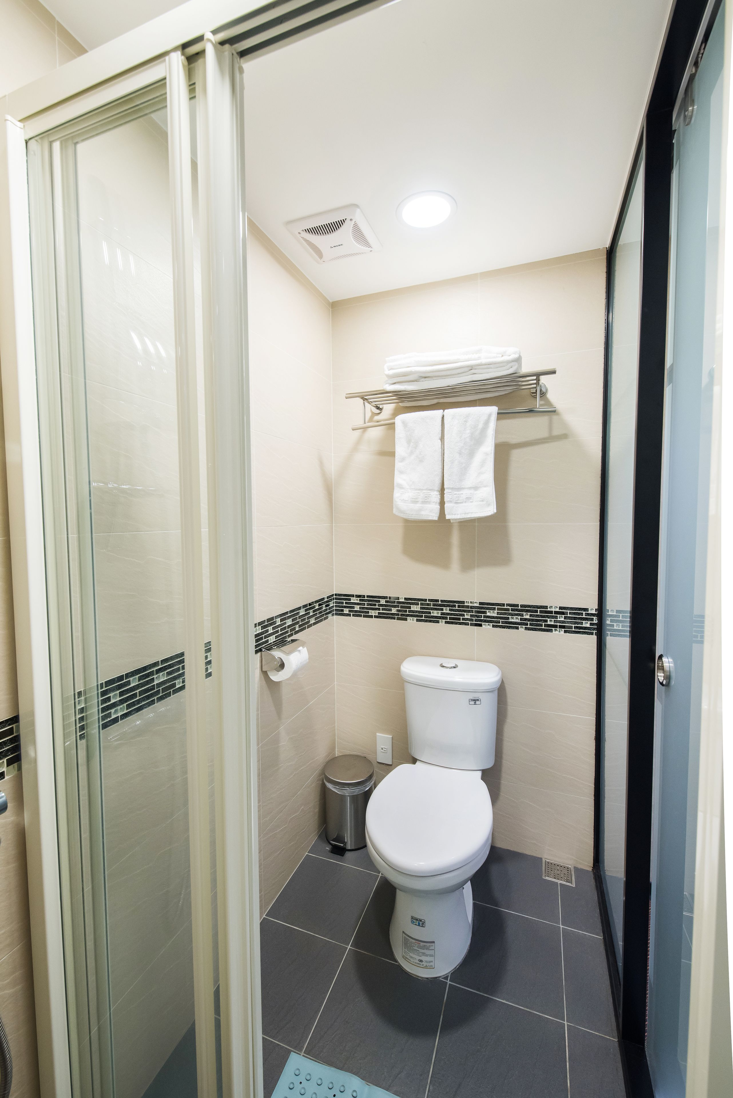 shower, free toiletries, slippers, towels