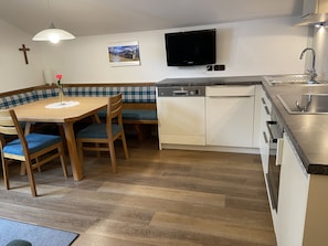 Apartment, 2 Bedrooms, Balcony, Mountain View | Private kitchen | Fridge, microwave, oven, stovetop - Ferienwohnungen Hinteranger (Tux)