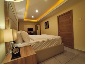 Superior Room | Living area | 32-inch LCD TV with satellite channels, TV - Iris Hotel (Abuja)