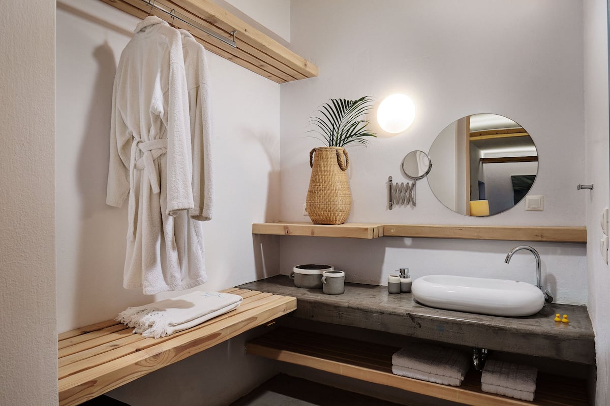 master suite panoramic sea view hot tub | bathroom | designer toiletries, hair dryer, bathrobes, slippers