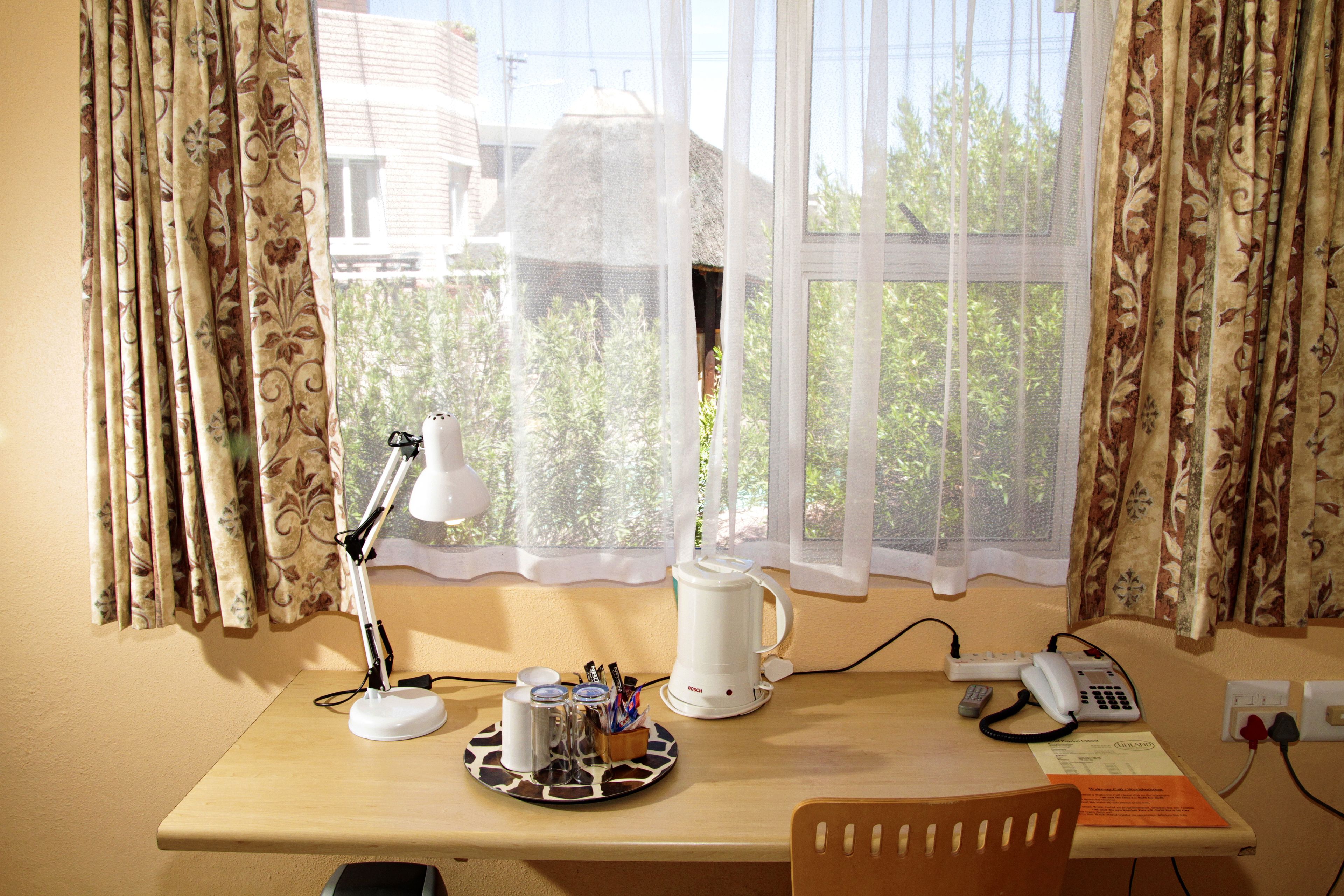 superior single room | 1 bedroom, minibar, desk, laptop workspace