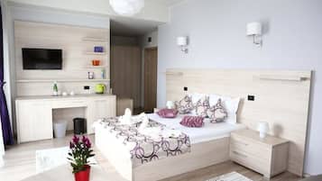 Junior suite, uitzicht op zee | Luxe beddengoed, een bureau, geluiddichte muren, extra bedden