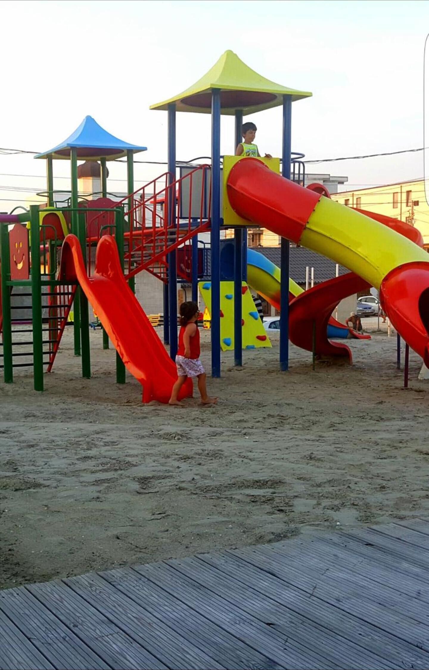 A playground with slides and climbing structures.