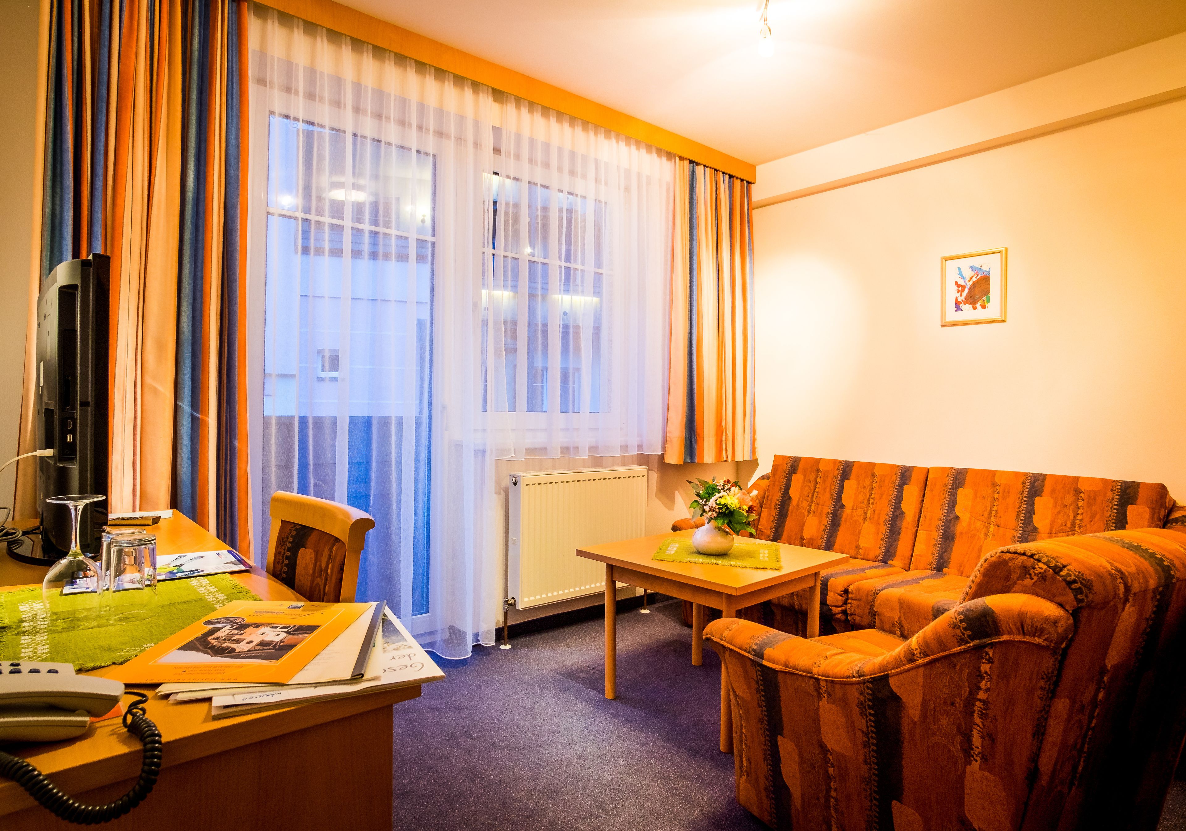 suite, balcony | living area | flat-screen tv