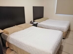 Family Studio Suite, 1 Bedroom | Desk, blackout drapes, iron/ironing board, free WiFi - Hgen Room & Suites (Los Mochis)