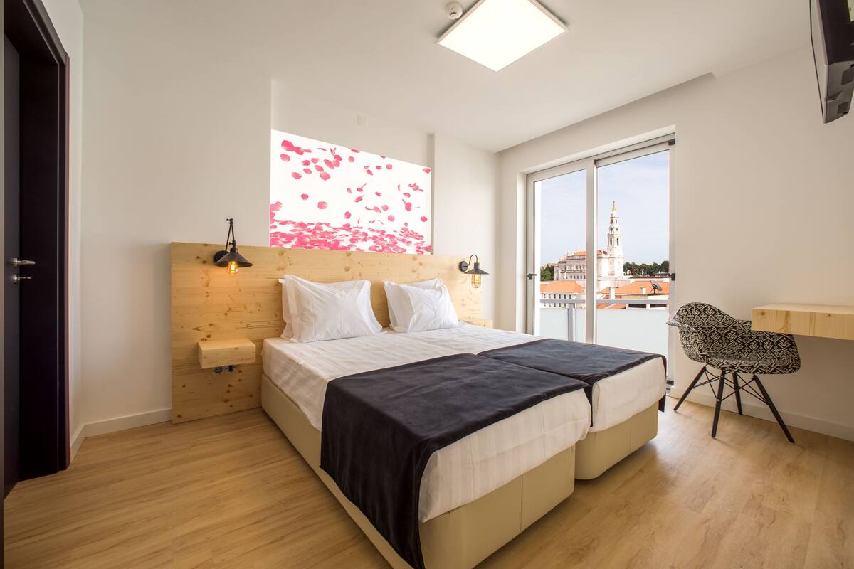 double or twin room, balcony | minibar, in-room safe, desk, blackout curtains