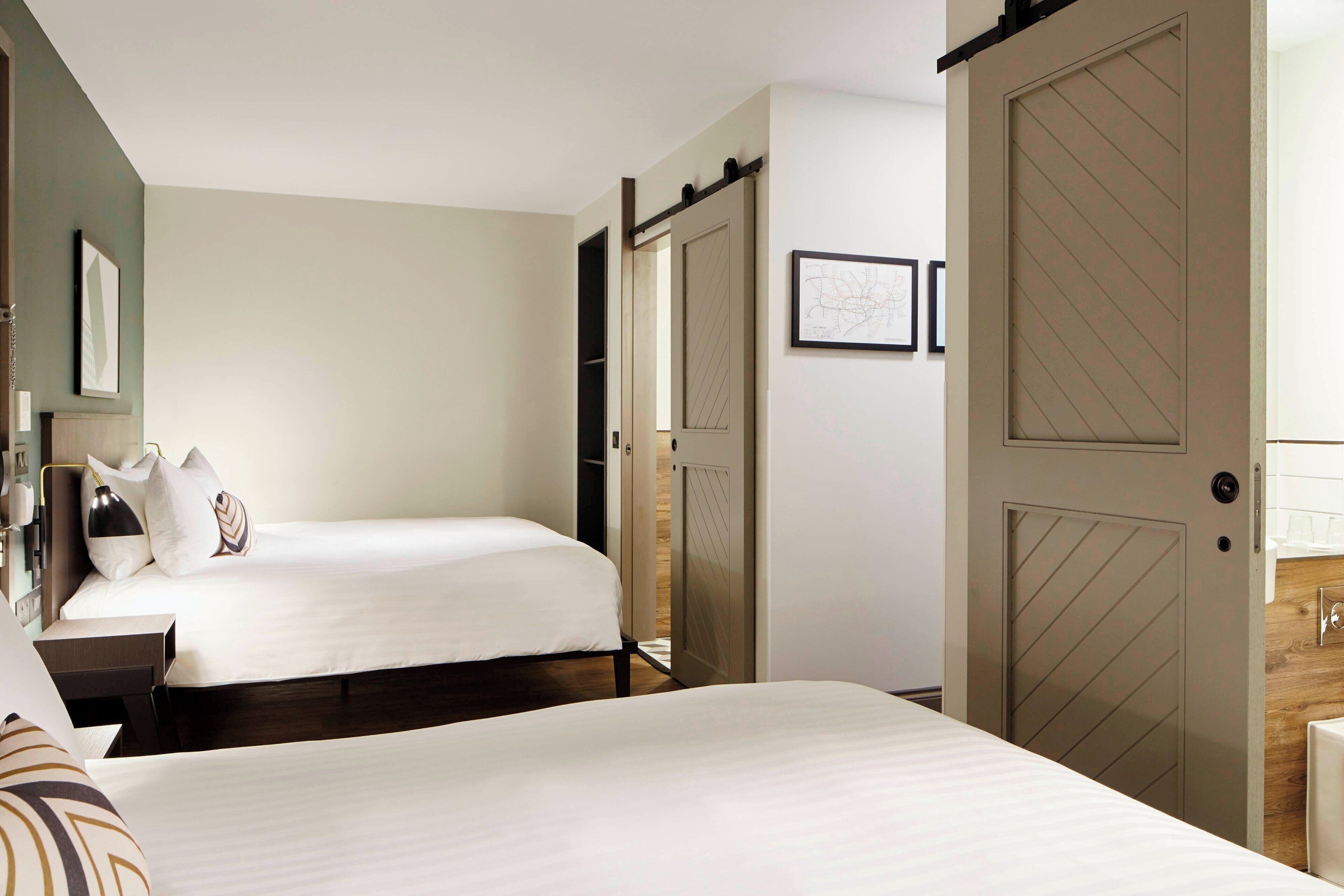 Deluxe Studio Suite, 2 Double Beds | Pillow-top beds, in-room safe, desk, blackout curtains
