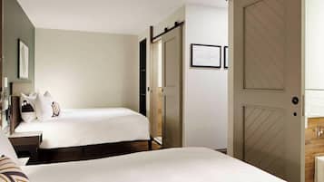 Deluxe Studio Suite, 2 Double Beds | Pillow-top beds, in-room safe, desk, blackout curtains
