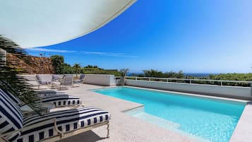 Outdoor pool, pool umbrellas, pool loungers