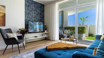 Exclusive Suite, 1 Bedroom, Garden View, Mountainside | Living area | 35-inch Smart TV with digital channels, Netflix, DVD player