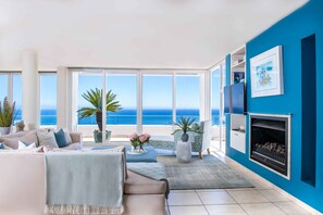 Exclusive Penthouse, 3 Bedrooms, Ocean View, Mountainside | Living area | 35-inch Smart TV with digital channels, Netflix, DVD player - Bay Reflections - Luxury Serviced Apartments (Cape Town)