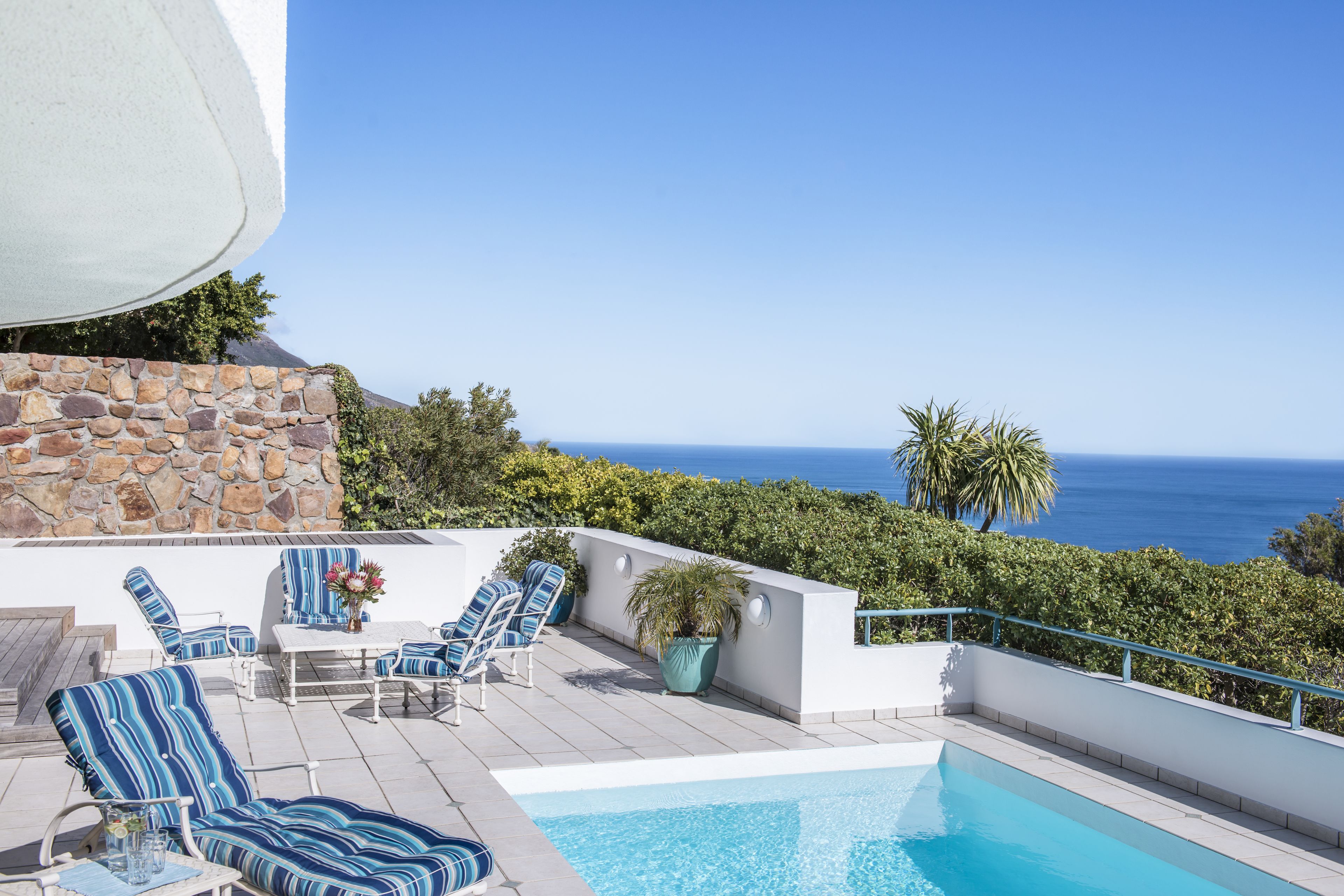 Outdoor pool, pool umbrellas, sun loungers