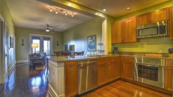 Condo, 2 Bedrooms | Private kitchen | Fridge, microwave, oven, stovetop