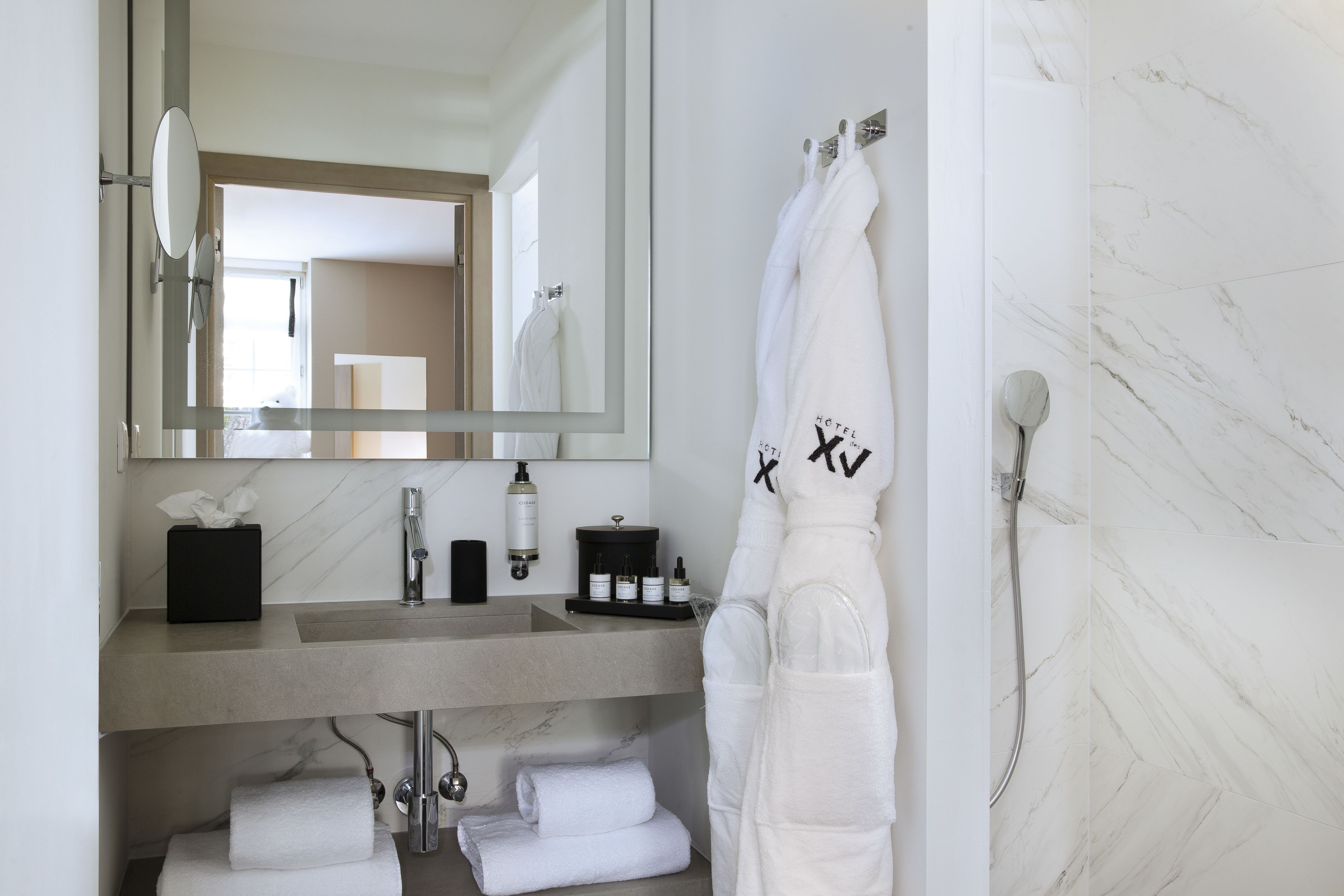 superior double room | bathroom | shower, rainfall showerhead, designer toiletries, hair dryer