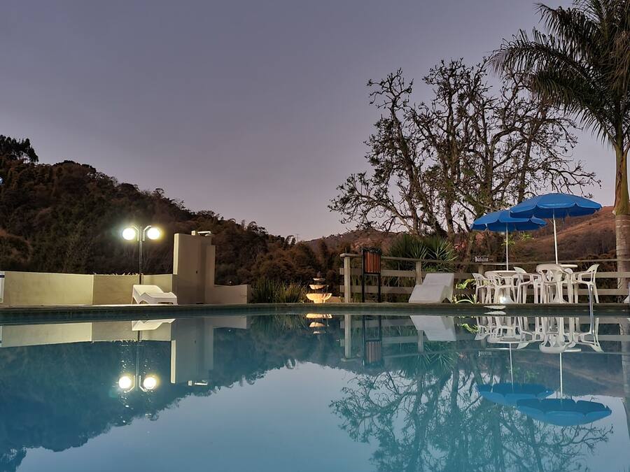 Outdoor pool, pool umbrellas, pool loungers