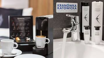A coffee machine dispensing espresso into a cup, a sink with running water, and two bottles of conditioner.