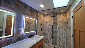 Combined shower/tub, hair dryer, towels, soap