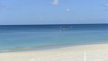 On the beach, sun loungers, beach towels
