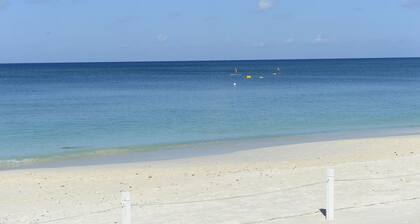 Prime Residence #7 on 7 Mile Beach, High-End Ground Floor Beachfront Condo