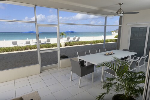Prime Residence #7 on 7 Mile Beach, High-End Ground Floor Beachfront Condo